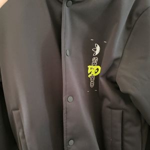 Adidas black bomber jacket size S.